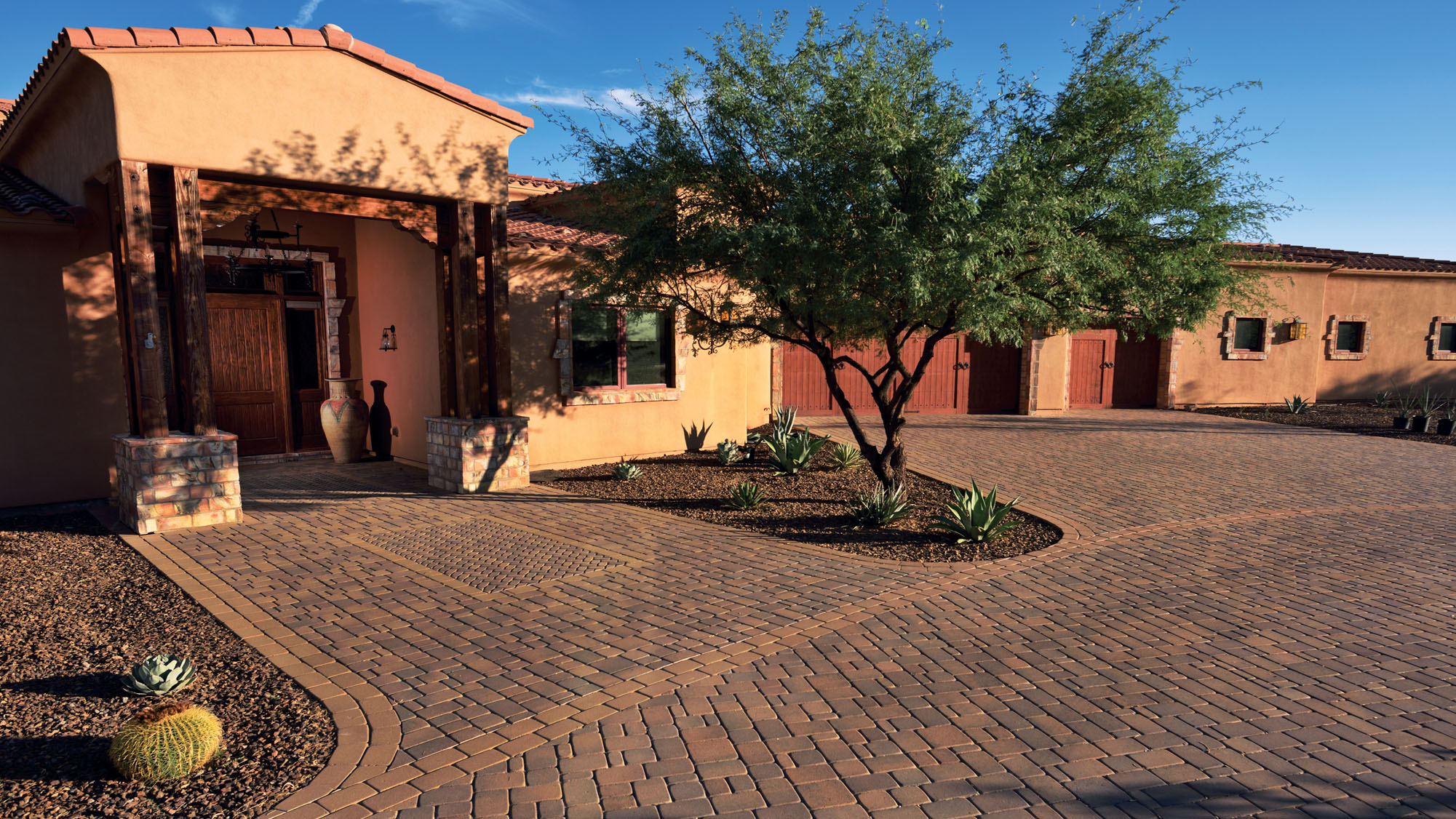 Home enterance and circular driveway in Standard Pavers, Territorial color blend.