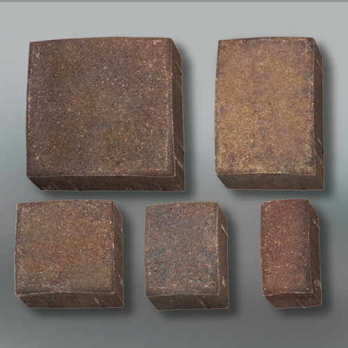 Studio photo on light gray background of the 4 standard paver sizes shown from overhead to show sizes in relation to each other