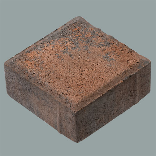  A studio photograp of a flat topped and miter edged Townscaoe paver from the front and above, The background is a litgh blue gray,