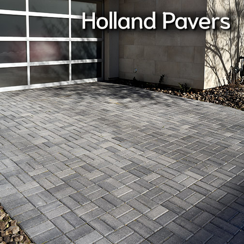 Holland Pavers in Slate color blend layed out in an alternating patern of 2 paver vertical next to 2 pavers horizontal repeating and stagered by row, These pavers have flat tops and 45º cut edges