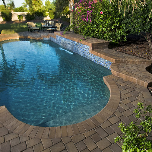 Veneer pavers and coping on a pool